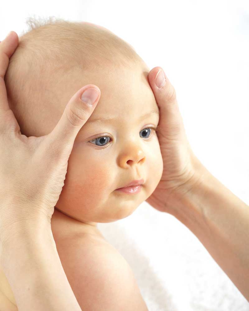 masaža bebine glave